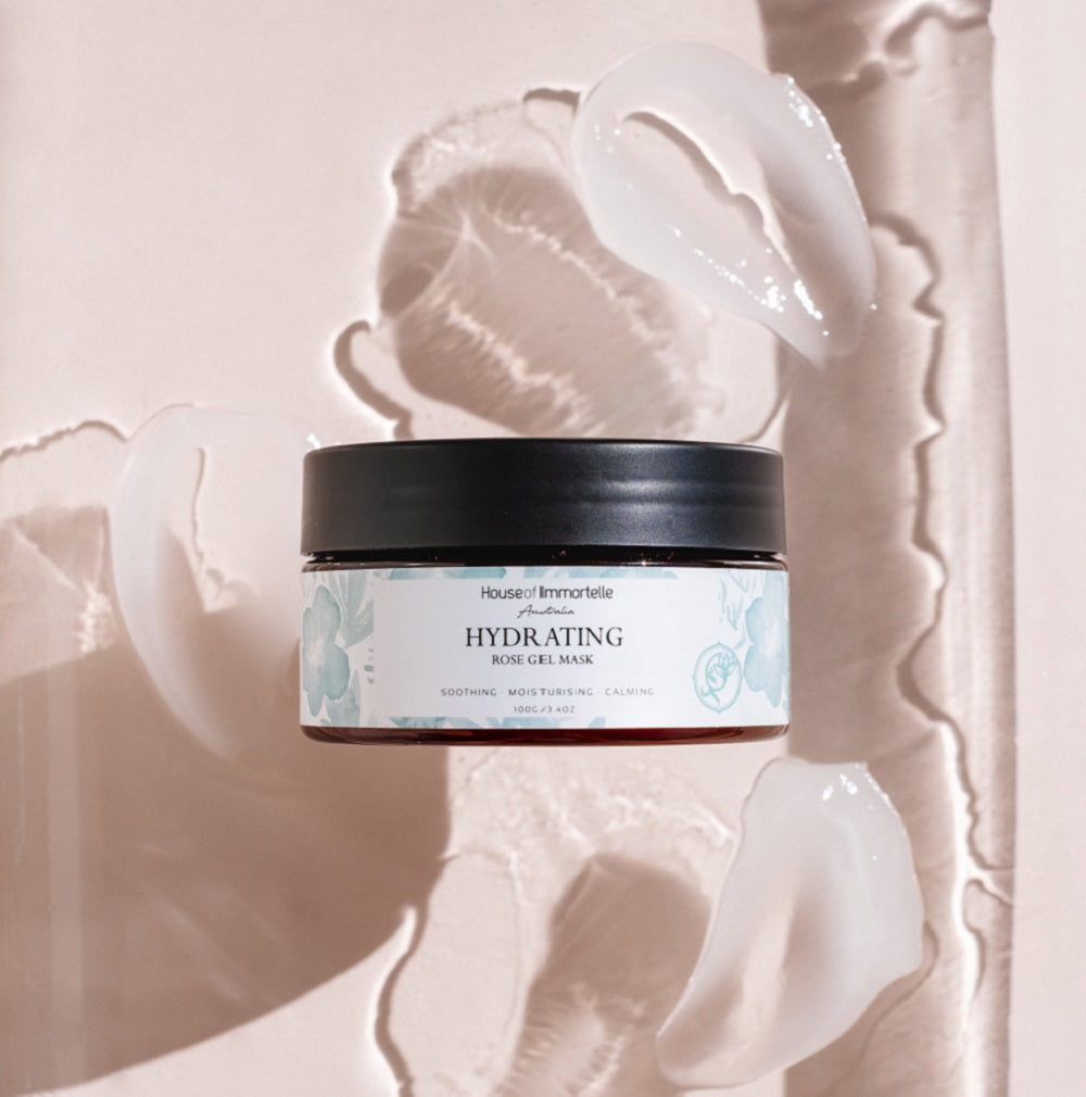 House of Immortelle Bestseller Hydrating Rose Gel Mask in a jar, featuring a refreshing gel formula infused with rose extract. This mask provides intense hydration and nourishment, leaving the skin feeling plump, radiant, and rejuvenated