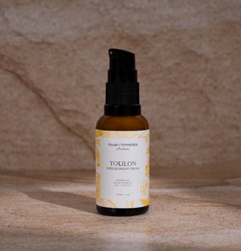 House of Immortelle Toulon Defense Night Cream in a luxurious jar, formulated to hydrate and repair the skin overnight. Rich in nourishing ingredients, this night cream helps to rejuvenate and protect the skin, leaving it smooth and revitalized by morning