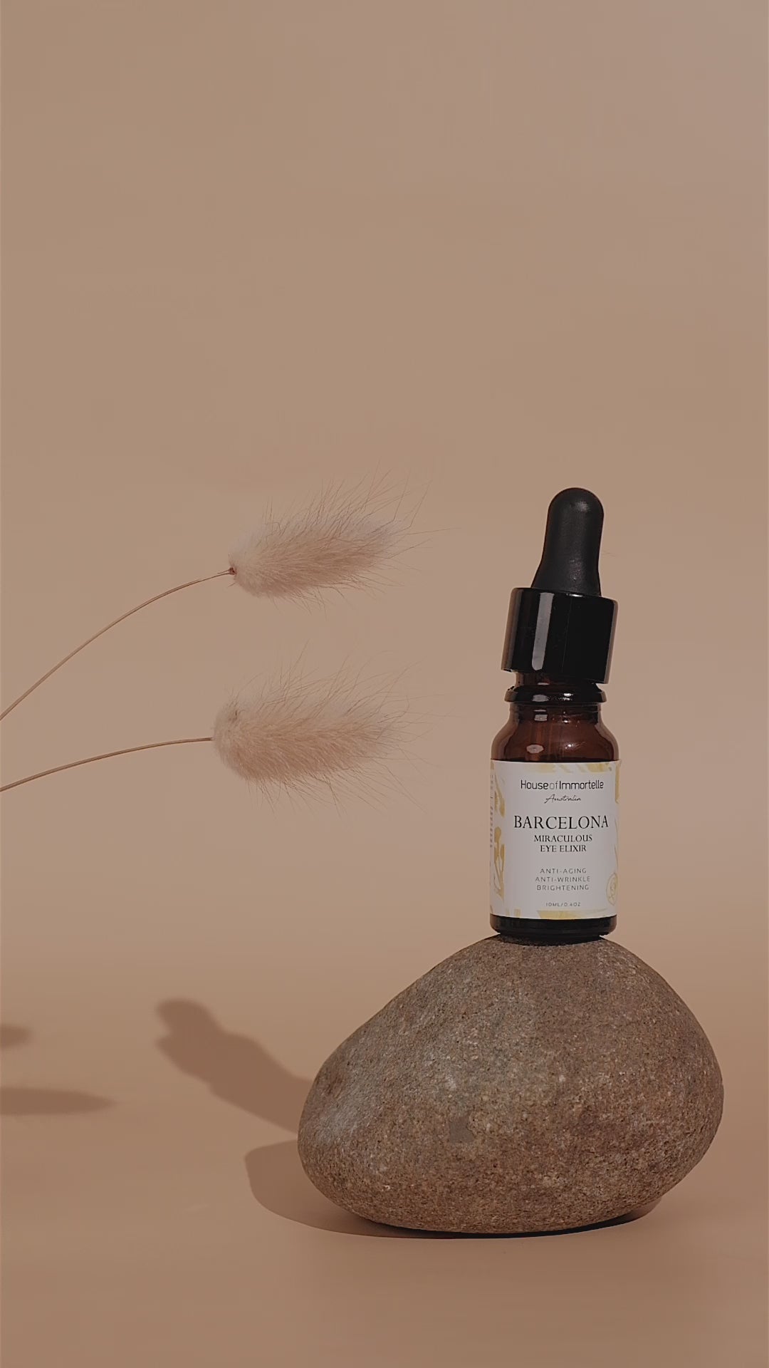 A rejuvenating Barcelona Miraculous Eye Elixir by House of Immortelle, formulated to reduce puffiness, dark circles, and fine lines around the delicate eye area. Its lightweight, soothing formula refreshes and revitalizes, leaving the eyes looking brighter and more youthful. Packaged in an elegant, travel-friendly bottle for daily use
