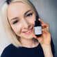 House of Immortelle B5 Rose Hydra Serum bottle with a sleek design and dropper cap. The serum is designed to deeply hydrate and soothe the skin, enriched with Vitamin B5 and rose extracts for a refreshed and radiant complexion