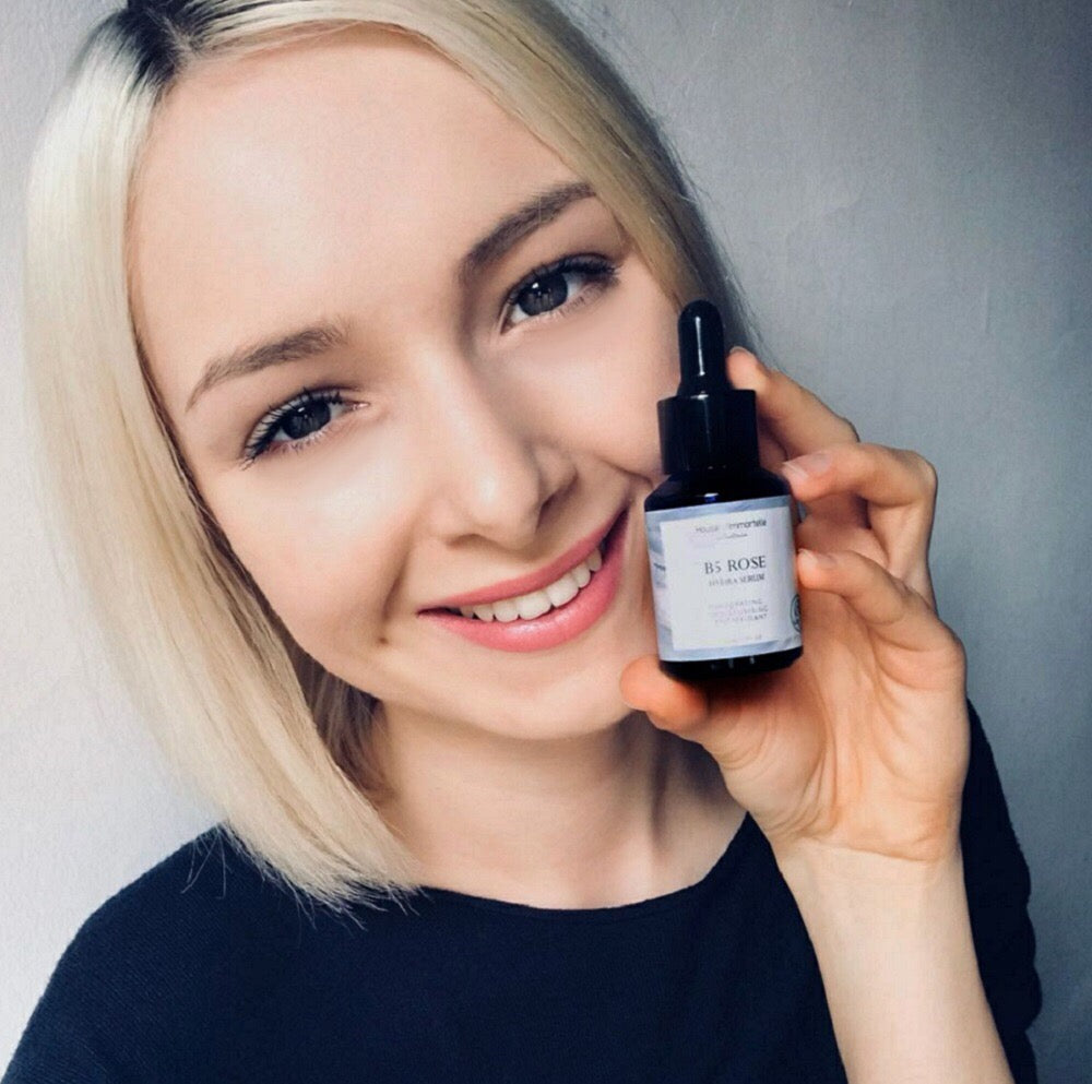 House of Immortelle B5 Rose Hydra Serum bottle with a sleek design and dropper cap. The serum is designed to deeply hydrate and soothe the skin, enriched with Vitamin B5 and rose extracts for a refreshed and radiant complexion