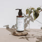 A soothing Gentle Cleansing Oil by House of Immortelle, designed to effortlessly dissolve makeup and impurities. Its nourishing formula gently cleanses while maintaining the skin’s natural moisture balance, leaving the face feeling refreshed and hydrated. Packaged in a sleek, elegant bottle for a luxurious skincare experience