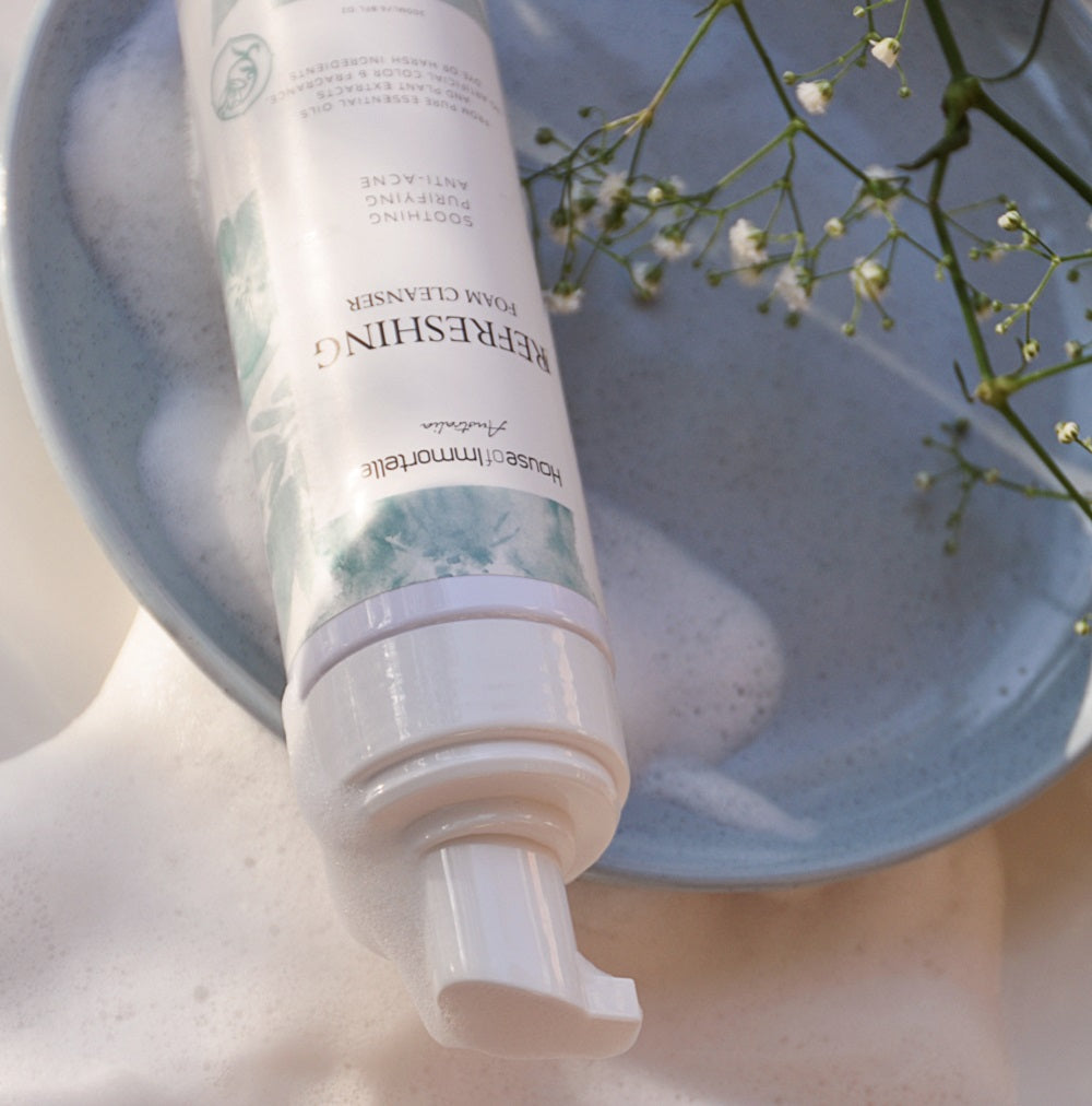 A luxurious refreshing foam cleanser by House of Immortelle, designed to deeply cleanse the skin. The airy foam gently removes impurities, leaving the skin feeling fresh, soft, and revitalized. Packaged in an elegant bottle, it blends natural ingredients for a soothing skincare experience