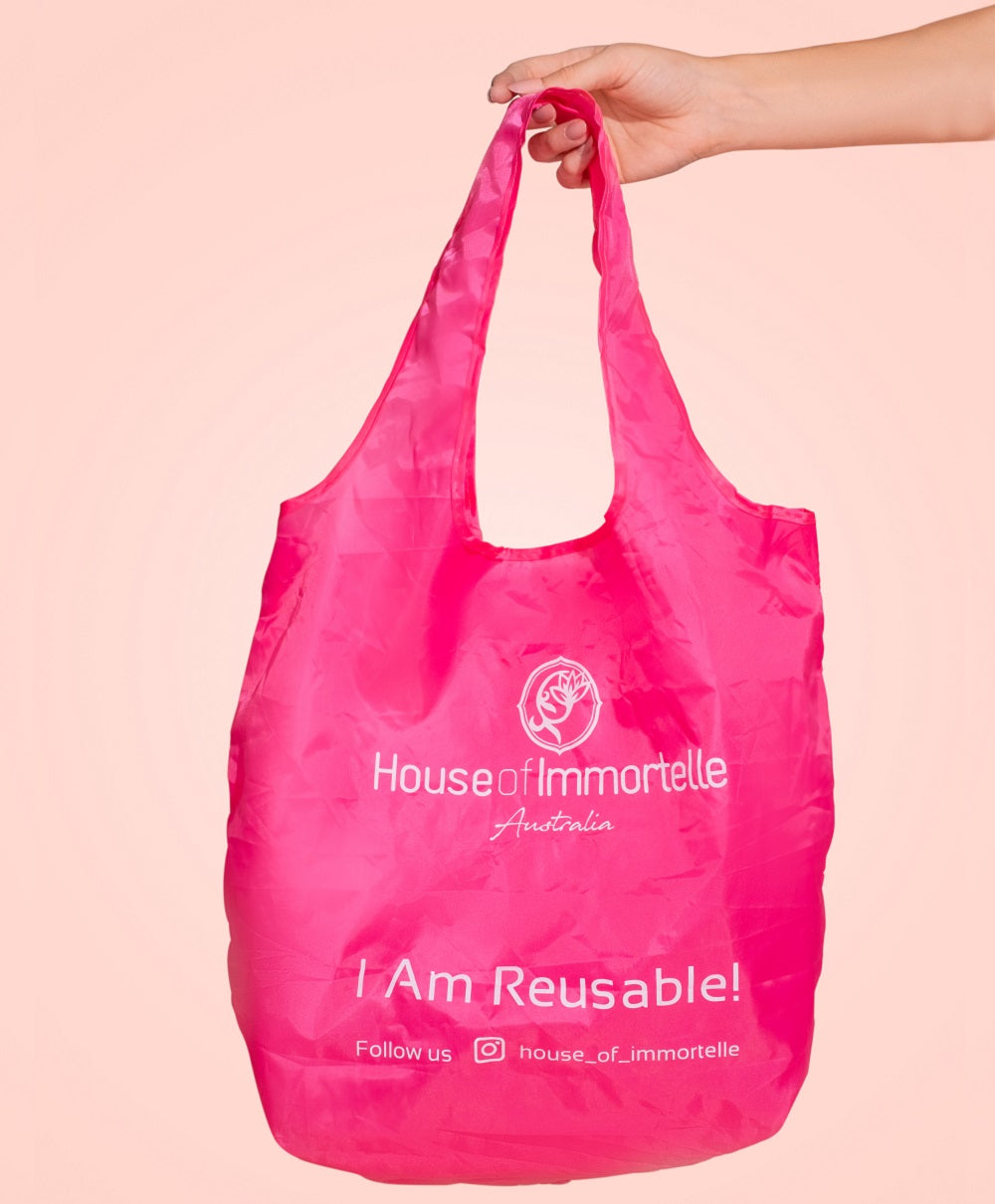 Durable and eco-friendly reusable shopping bag made from sturdy fabric, with a vibrant design and comfortable handles, perfect for sustainable shopping