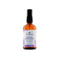 House of Immortelle Warm-Up Spike Lavender Massage Body Oil in a stylish bottle, infused with calming lavender and invigorating spices. The oil is designed to warm and relax muscles, with a smooth texture and a soothing fragrance, ideal for relieving tension and stress